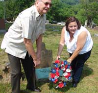 Wreath being placed on Boaz Fleming Gravesite